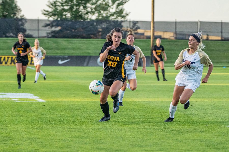 Iowa+forward+Devin+Burns+runs+down+the+ball+during+a+womens+soccer+match+between+Iowa+and+Western+Michigan+on+Thursday%2C+August+22%2C+2019.+The+Hawkeyes+defeated+the+Broncos%2C+2-0.