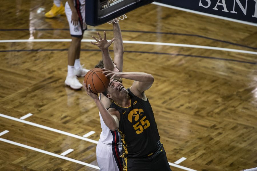 Saturday, Dec. 19, 2020; Sioux Falls, South Dakota, USA;  Iowa center Luka Garza attempts a basket during the first half of the Iowa v. Gonzaga basketball game at the Sanford Pentagon. Gonzaga basketball game at the Sanford Pentagon. Gonzaga leads against Iowa with a score of 51-37 after the first half. Mandatory Credit: Katie Goodale/Daily Iowan via USA TODAY Network