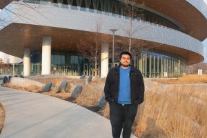 Author Jesus “Chuy” Renteria standing in front of Hancher Auditorium is seen on December 6 2020. Renteria and Associate Professor Christine Shea will attend Obermann Around The Table to talk about their bilingual experiences and bilingualism in Iowa as a whole.