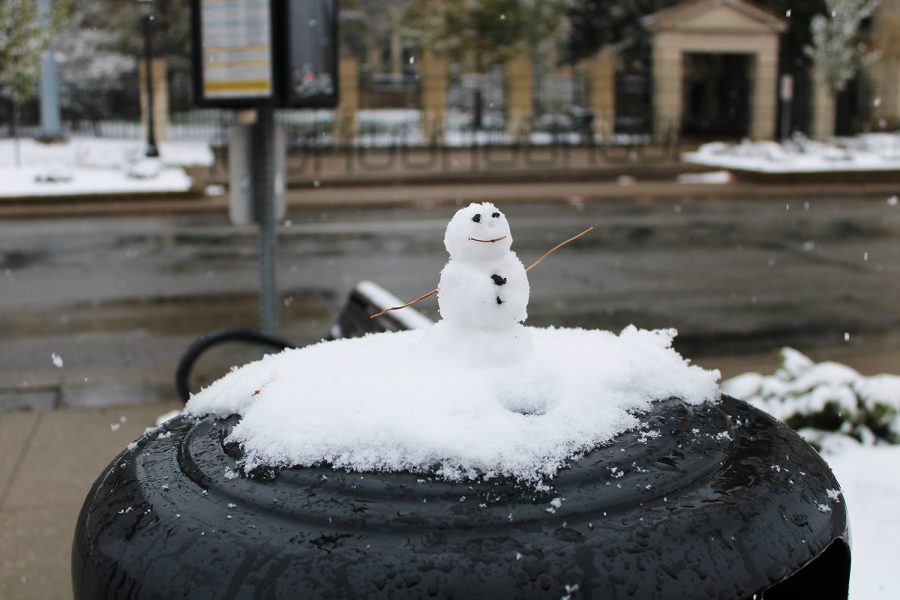 A+snowman+is+seen+sitting+on+top+of+a+trashcan+on+the+Pentacrest+on+Oct.+19%2C+2020.