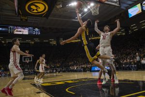 Iowa center Luka Garza shoots a reverse layup during a basketball game between Iowa and Wisconsin on Monday, Jan. 27, 2020 at Carver Hawkeye Arena. The Hawkeyes defeated the Badgers, 68-62. 