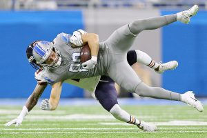 Detroit Lions tight end T.J. Hockenson (88) is tackled by Chicago Bears safety Ha Ha Clinton-Dix (21) after catching a pass in the first quarter of their NFL game at Ford Field in Detroit, on Thursday, November 28, 2019.