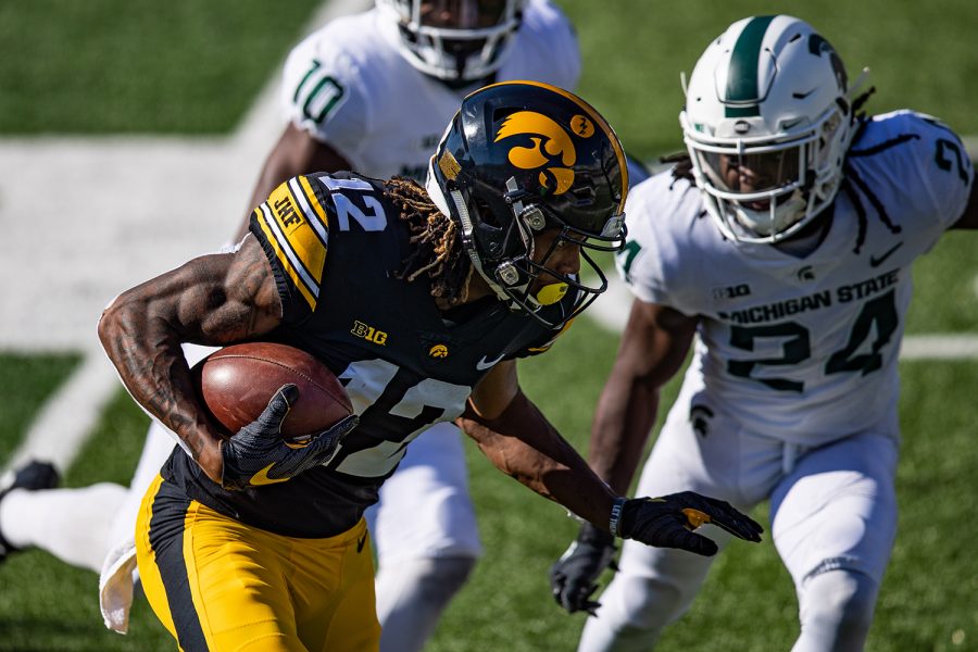 Iowa wideout Brandon Smith runs after a catch during a football game between Iowa and Michigan State in Kinnick Stadium on Saturday, Nov. 7, 2020. The Hawkeyes dominated the Spartans, 49-7. 