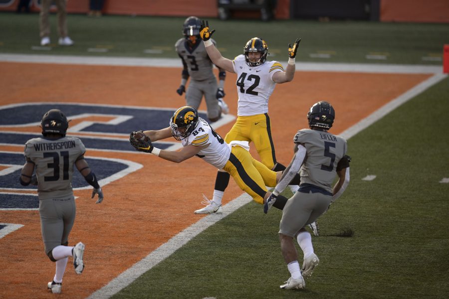 Iowa tight end Sam LaPorta (84) scores Iowa’s first touchdown of the game during the second quarter of the Iowa v. Illinois football game at Memorial Stadium on Saturday, Dec. 5, 2020.