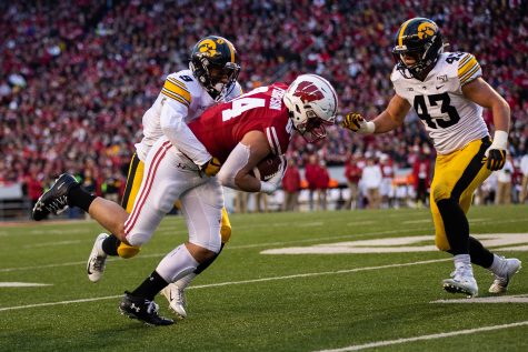 Iowa defensive back Geno Stone makes a tackle during a game against Wisconsin at Camp Randall Stadium on Saturday, November 9, 2019. The Hawkeyes were defeated by the Badgers 24-22.  The Hawkeye defense had a total of 67 tackles. 