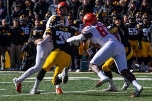 Iowa line backer Kristian Welch rushes Illinois quarter back Brandon Peters during the game against Illinois on Saturday, November 23, 2019. The Hawkeyes defeated the Fighting Illini 19-10.