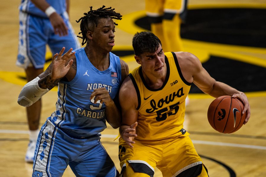 Iowa forward Luka Garza dribbles during a men’s basketball game between Iowa and North Carolina at Carver-Hawkeye Arena on Tuesday, Dec. 8, 2020. The Hawkeyes defeated the Tar Heels, 93-80. 