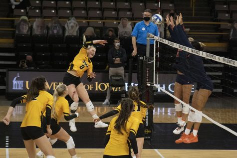 Kyndra Hansen spikes the ball toward Illinois during the volleyball match between Illinois and Iowa on Saturday Jan 23, 2021, at Carver-Hawkeye Arena. Illinois beat the Hawkeyes 3:1. 