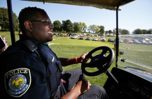 University of Iowa Police Officer Alton Poole wears his VIEVU LE2 Body Worn Video Camera as he patrols the Finkbine Golf Course tailgating lot before Iowas game against Northern Iowa Saturday, Sept. 15, 2012 in Iowa City. The University of Iowa has outfitted all 43 of their police officers and 18 members of their security staff with the cameras at a cost of $899 each. 
