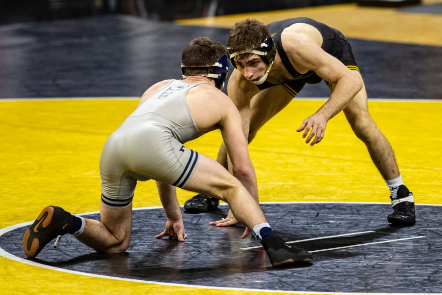 Iowa%E2%80%99s+133-pound+Austin+DeSanto+grapples+with+Illinois%E2%80%99+Lucas+Byrd+during+a+wrestling+dual+meet+between+Iowa+and+Illinois+at+Carver-Hawkeye+Arena+on+Sunday%2C+Jan.+31%2C+2021.+No.+4+Austin+DeSanto+defeated+No.+23+Lucas+Byrd+by+major+decision%2C+18-6%2C+and+the+Hawkeyes+defeated+the+Fighting+Illini%2C+36-6.