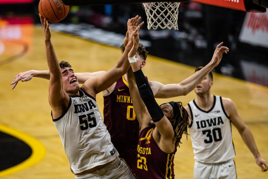 Iowa forward Luka Garza lays the ball up during a mens basketball game between Iowa and Minnesota at Carver-Hawkeye Arena on Sunday, Jan. 10, 2021. The Hawkeyes defeated the Golden Gophers, 86-71. (Shivansh Ahuja/The Daily Iowan)