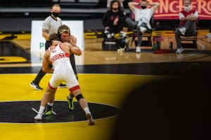 Iowa’s 197-pound Jacob Warner grapples with Nebraska’s Eric Shultz during a wrestling dual meet between No. 1 Iowa and No. 6 Nebraska at Carver Hawkeye Arena on Friday, Jan. 15, 2021. No. 2 Shultz defeated No. 4 Warner by decision, 3-2, and the Hawkeyes defeated the Cornhuskers, 31-6.
