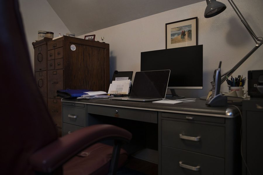 An open laptop is seen on Marvin Bells desk in his office upstairs on Saturday, Jan. 30, 2021 at the Bell familys house in Iowa City. The Bell family had left Marvins office space untouched, except for some cleaning they had done around the house.