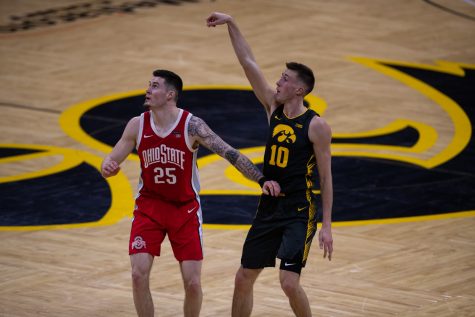 Iowa’s Joe Wieskamp (10) is seen moments after a 3-point shot during a men’s basketball game between the Iowa Hawkeyes and the Ohio State Buckeyes at Carver-Hawkeye Arena on Thursday, Feb. 4, 2021. The Buckeyes defeated the Hawkeyes in a close game, 89-85.