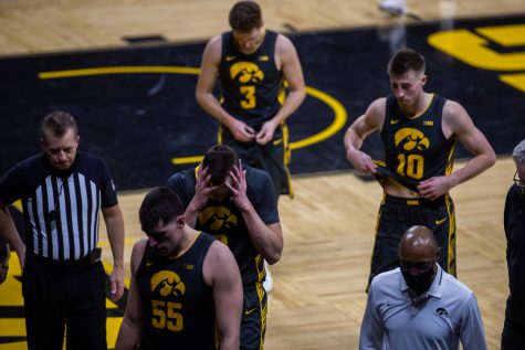 The Iowa men’s basketball team walks to the locker room after a men’s basketball game between the Iowa Hawkeyes and the Ohio State Buckeyes at Carver-Hawkeye Arena on Thursday, Feb. 4, 2021. The Buckeyes defeated the Hawkeyes in a close game, 89-85.