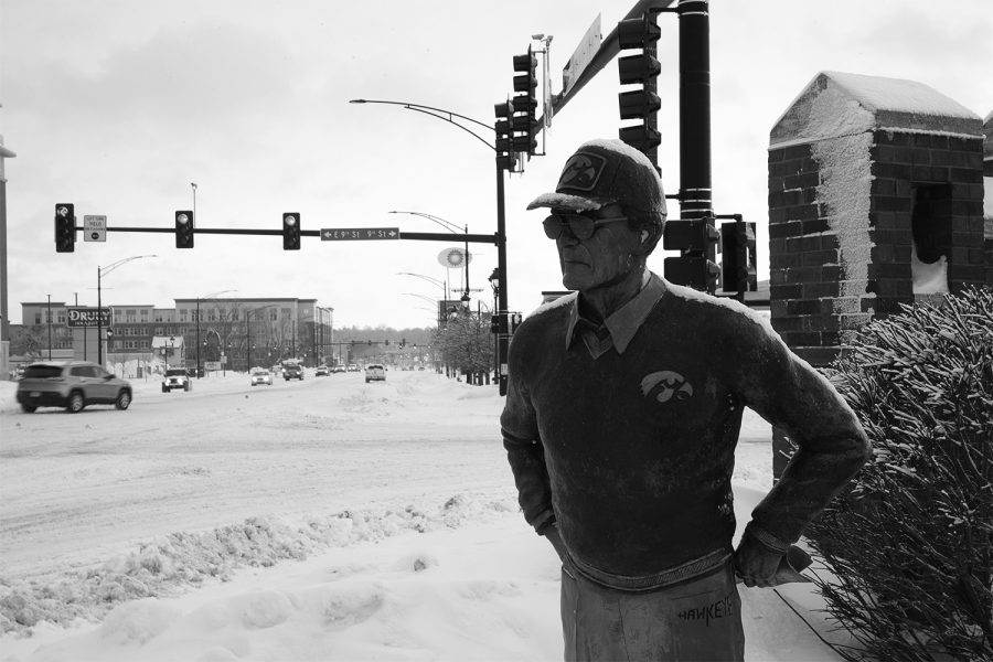 The Hayden Fry Statue covered in snow on Hayden Fry Way and Iowa River Landing is seen on February 4 2021.