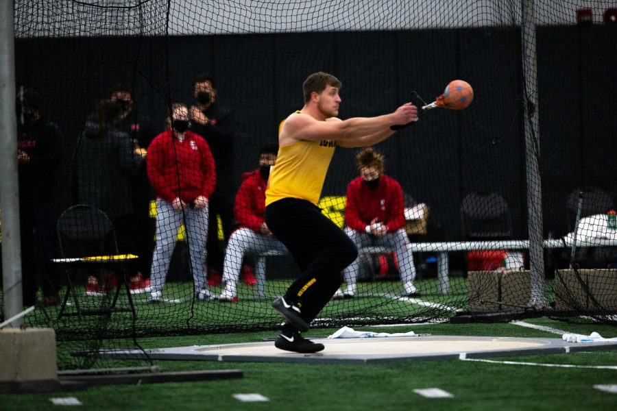 Iowa Weight Thrower Tyler Lienau winds up to throw. Lienau finished second with his best throw on the day going 20.68 meters at the Hawkeye B1G Invitational track and field meet at the University of Iowa Hawkeye Tennis and Recreation Complex on Saturday, Feb. 13 , 2021.