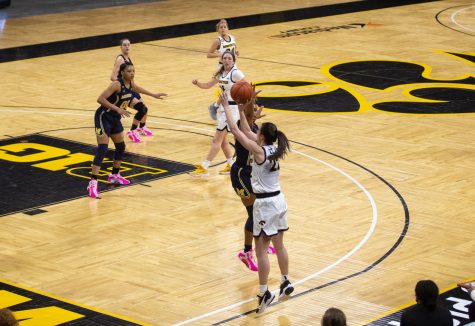 Iowa Guard Caitlin Clark releases from the corner during a womens basketball game against Michigan on Thursday, Feb. 25, 2021 at Carver Hawkeye Arena. The Hawkeyes defeated the Wolverines 89-67.