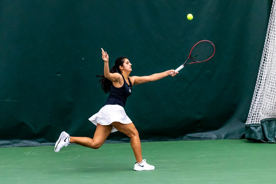 Iowa’s Vipasha Mehra signals a point during the Iowa Women’s Tennis match against Purdue on Feb. 28, 2021 at the Hawkeye Tennis and Recreation Complex. Iowa defeated Purdue 6-1.