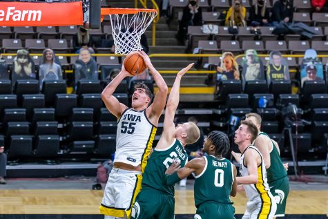 Iowa Center Luka Garza goes in for a layup during the Iowa Men’s Basketball game against Michigan on Feb. 2, 2021 at Carver-Hawkeye Arena. Iowa defeated Michigan 84-78. (Casey Stone/The Daily Iowan)