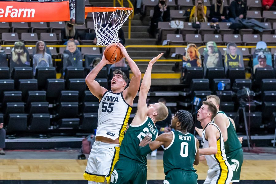 Iowa+Center+Luka+Garza+goes+in+for+a+layup+during+the+Iowa+Men%E2%80%99s+Basketball+game+against+Michigan+on+Feb.+2%2C+2021+at+Carver-Hawkeye+Arena.+Iowa+defeated+Michigan+84-78.+%28Casey+Stone%2FThe+Daily+Iowan%29