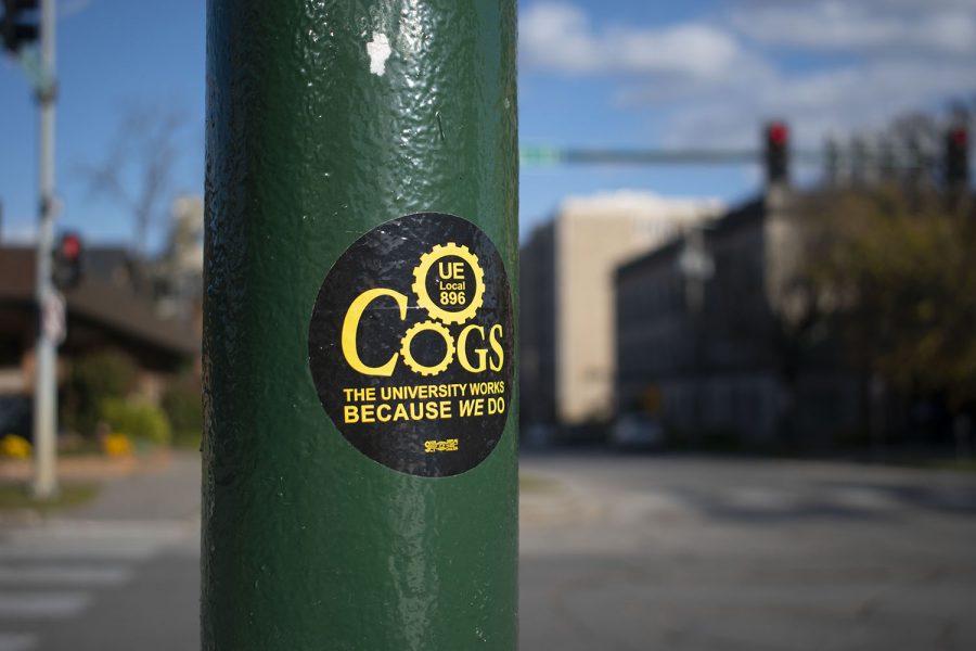 A COGS sticker is seen on a stop light post on Friday, October 16, 2020. 