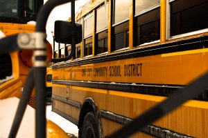 Iowa City Community school buses are seen outside of Liberty High School on Sunday, Feb. 14, 2021. 