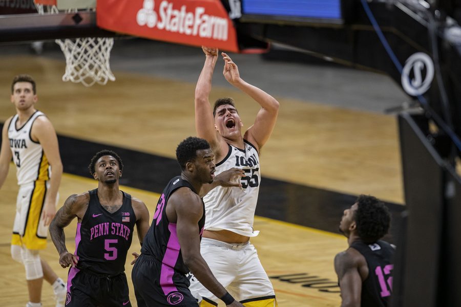 Sunday, Feb. 21, 2021; Iowa City, Iowa, USA; Iowa center Luka Garza (55) shoots a basket during the first half of a mens basketball game against Penn State on Sunday, Feb. 21, 2021 at Carver Hawkeye Arena. The Hawkeyes are down five points against the Nittany Lions, 36-41. At halftime Garza is two points away from breaking the record for Iowas all-time leading scorer. 