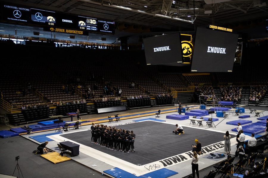 The+Iowa+women%E2%80%99s+gymnastics+team+watches+a+video+together+after+a+women%E2%80%99s+gymnastics+meet+between+the+Iowa+Gym-Hawks+and+the+Minnesota+Golden+Gophers+at+Carver-Hawkeye+Arena+on+Saturday%2C+Feb.+6%2C+2021.+The+video+was+dedicated+to+fighting+racial+injustice+and+creating+unity.+The+Hawks+defeated+the+Gophers%2C+196.800-196.375.+