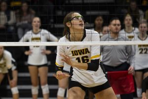 Middle blocker Grace Tubbs follows the ball during the Iowa and Nebraska volleyball game. The Huskers defeated the Hawkeyes in three sets on November 9, 2019, at Carver-Hawkeye Arena. 