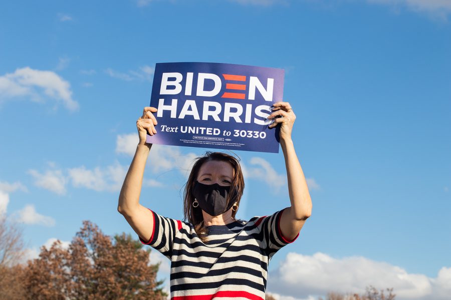 Christina Bohannan, Representative-Elect for the Iowa House of Representatives in District 85, holds a Biden-Harris sign in the air. Patrons celebrate the Biden Harris presidential victory in Mercer Park on Sunday. The event was hosted by Johnston County Supervisor RoyceAnn Porter. Patrons celebrate the Biden Harris presidential victory in Mercer Park on Sunday. The event was hosted by Johnston County Supervisor RoyceAnn Porter.