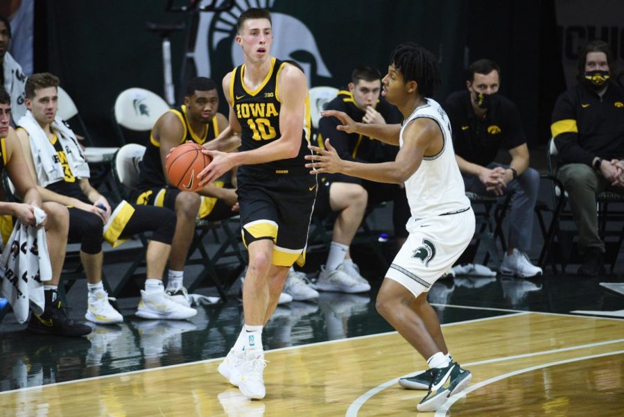 Iowa+Hawkeyes+guard+Joe+Wieskamp+%2810%29+looks+to+pass+the+ball+against+Michigan+State+during+the+second+half+at+Jack+Breslin+Student+Events+Center.