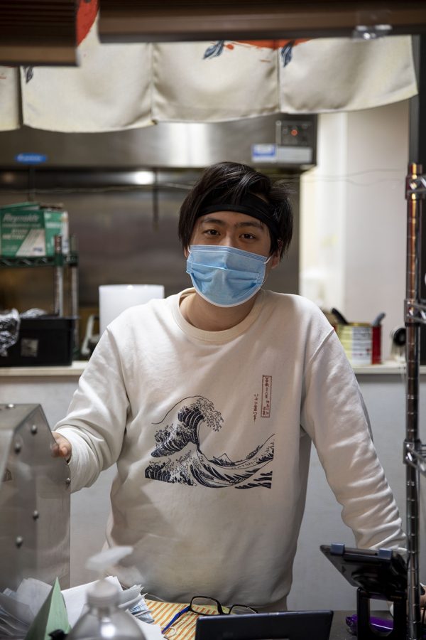 Yi Zhang poses for a portrait on Wednesday, Feb. 3, 2021. Zhang is the owner of both The Lark and Owl, and JiangHu Asia Street Food. Zhang combined both places due to loss of revenue from the pandemic. 