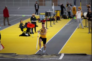 Iowa Pole Vaulter Peyton Haack runs up to his launching point. Haack finished 16th during the Hawkeye B1G Invitational track meet at the University of Iowa Recreation Building on Saturday, Feb. 13 , 2021. 