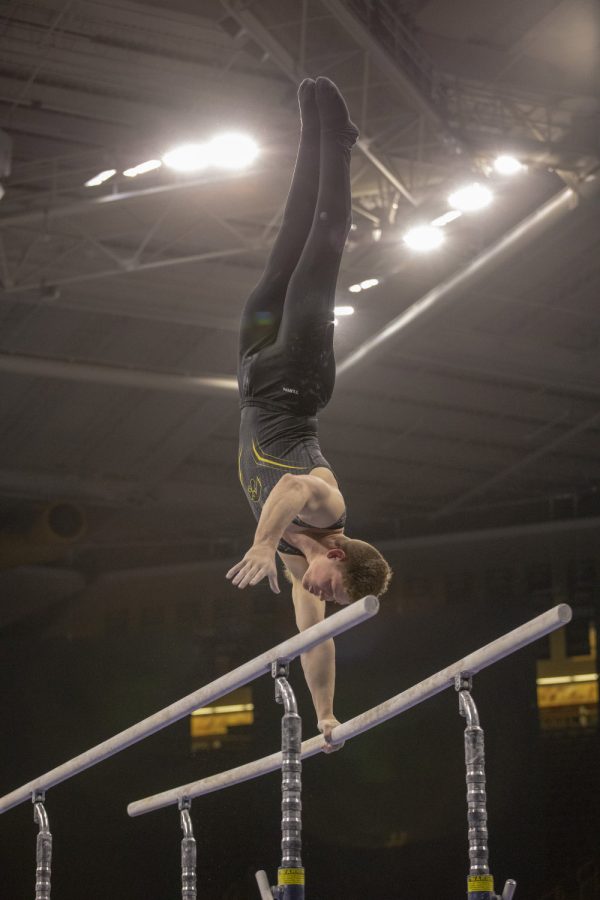 Iowa gymnast Stewart Brown competes during the Big Ten Championships in April 2019. 