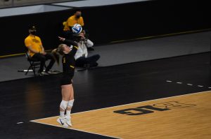 Iowa Libero Joslyn Boyer jumps up to hit a serve during a womens volleyball match between Iowa and Rutgers at Xtream Arena on Saturday, Feb. 20, 2021. The Scarlet Knights defeated the Hawkeyes 3 sets to 2.
