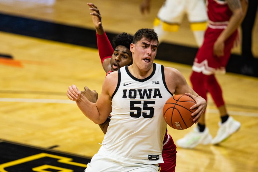 Iowa forward Luka Garza drives forward during a mens basketball game between Iowa and Rutgers at Carver-Hawkeye Arena on Wednesday, Feb. 10, 2021. The Hawkeyes defeated the Scarlet Knights, 79-66.