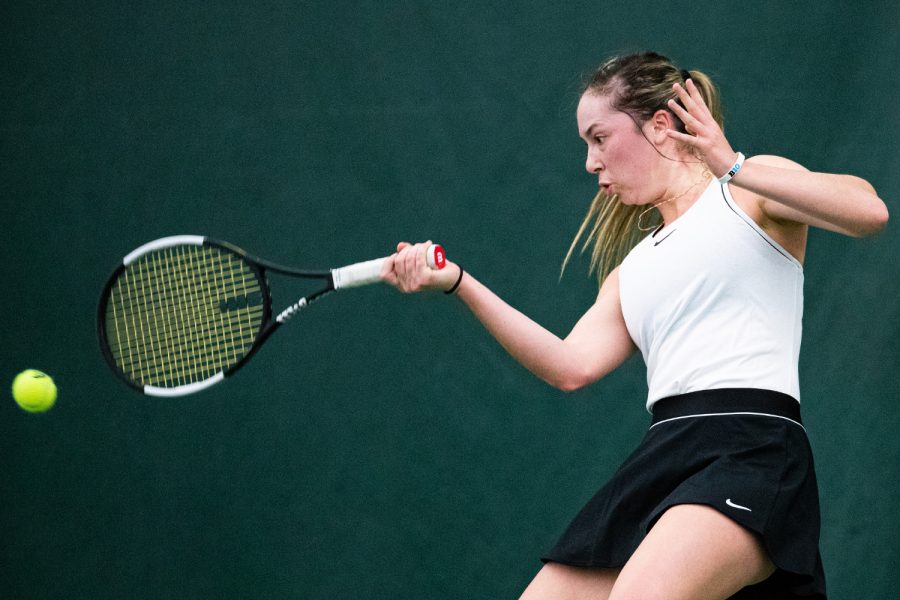 Iowas Samantha Mannix hits a forehand during a womens tennis match between Iowa and Colorado at the HTRC on Sunday, Feb. 16, 2020. 