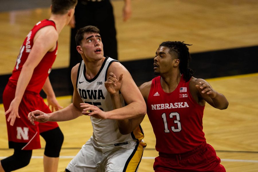 Iowa Forward Luka Garza (55) anticipates a rebound during an Iowa men’s basketball game against Nebraska on Thursday, March 4, 2021 at Carver-Hawkeye arena. The Hawks beat the Cornhuskers, 102-64.