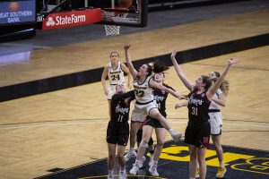 Iowa guard Caitlin Clark (22) goes for the basket during the Iowa women’s basketball game v. Nebraska in Carver-Hawkeye Arena on March 6, 2021. Iowa defeated Nebraska with a score of 83-75 .
