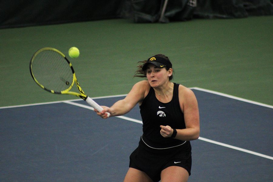 Iowas Danielle Bauers hits the ball during her doubles match at the Iowa womens tennis meet v. Ohio State on Sunday, March 7, 2021. The Hawkeyes were defeated by the Ohio State Buckeyes 2-5.