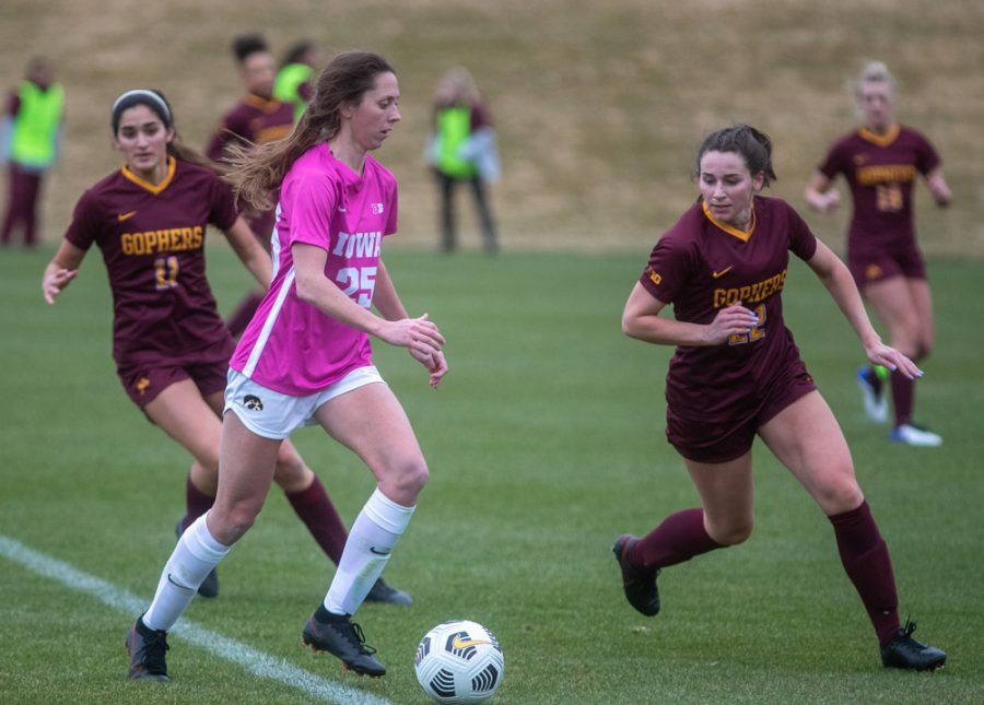 Iowa Midfielder Josie Durr works to control the ball during a soccer game between Iowa and Minnesota on March 14, 2021 at the Iowa Soccer Complex. The Gophers defeated the Hawkeyes 1-0. 