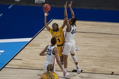 Iowa guard Tomi Taiwo attempts to shoot a basket during the Sweet Sixteen NCAA womens basketball championship against UConn on Saturday, March 27, 2021 at the Alamodome in San Antonio, Texas. The Hawkeyes were defeated by the Huskies, 92-72. While No. 5 Iowa played their last game today, No. 1 UConn will advance to the Elite Eight on Monday.