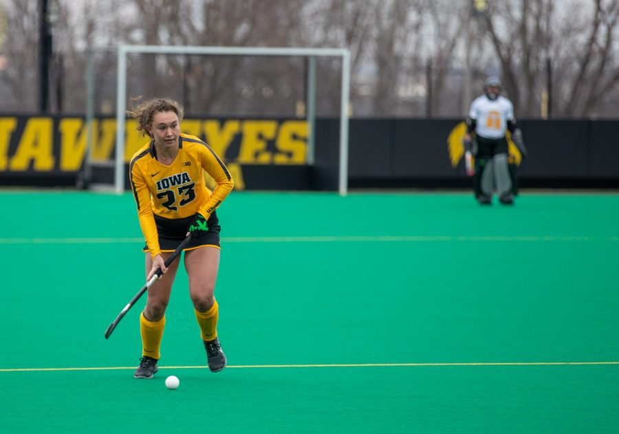 Iowa Midfielder Harper Dunne looks down field for a teammate during a field hockey game between Iowa and Michigan State at Grant Field on Friday, March 28, 2021. The Hawkeyes defeated the Spartans 2-0.