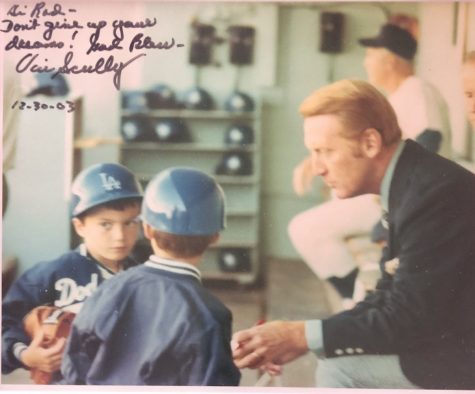 Rod Lehnertz, age six, and his brother meet Los Angeles Dodgers play-by-play voice, Vin Scully in 1971. Scully later signed the image in 2003, “Hi Rod don’t give up on your dreams. God bless, Vin Scully” on the top right corner of the image.