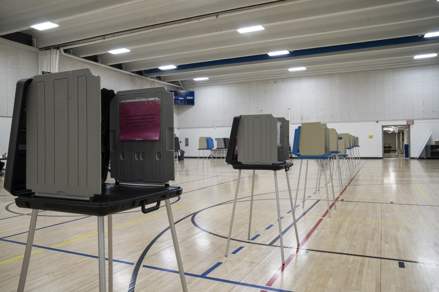 Polling booths at the Robert A. Lee Community Recreation Center in Iowa City on Tuesday, Nov. 03, 2020. Few voters came as the evening approached 7:00 PM.