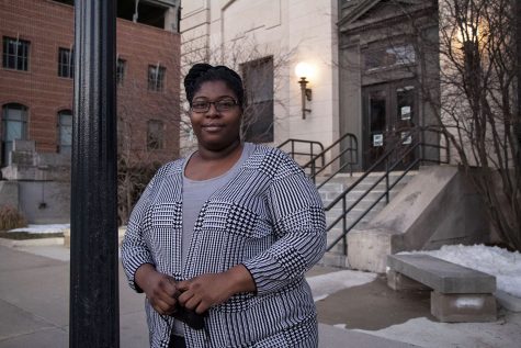 Senior Center Coordinator, LaTasha DeLoach, poses for a portrait outside of The Center Senior Center in Iowa City on Monday March 1, 2021. DeLoach coordinated an outreach phone bank at the Senior Center where they schedule vaccine appointments for older community members. 