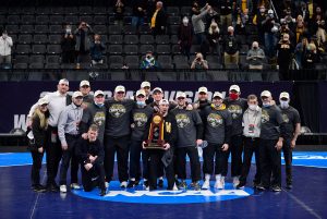 Mar 20, 2021; St. Louis, Missouri, USA;  Iowa Hawkeyes wrestling team pose for a photo after winning the NCAA Division I Wrestling Championships at Enterprise Center. Mandatory Credit: Jeff Curry-USA TODAY Sports