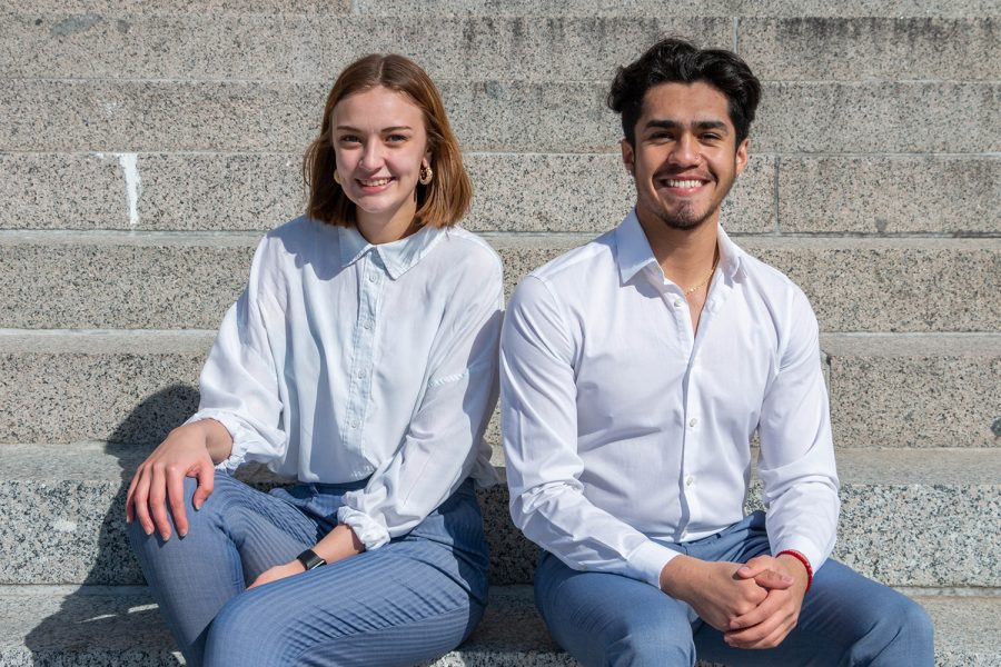 University of Iowa students José Muñiz Jr. and Regan Smock pose for a portrait outside of the Old Capital building on Sunday afternoon. Muniz and Smock are running for office in the upcoming University Student Government election. 