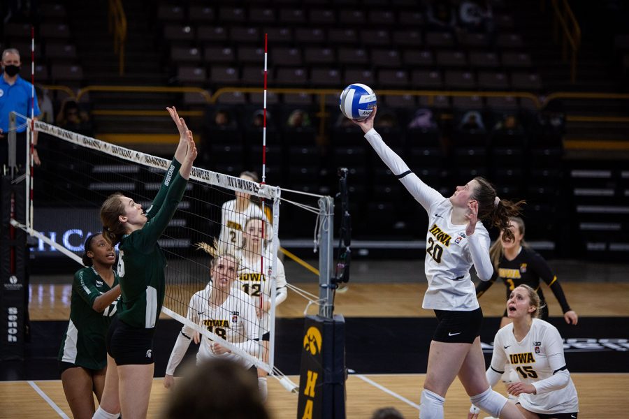 Iowa outside hitter, Edina Schmidt, hits the ball during the volleyball match between Iowa and Michigan State on Friday, March 26 at Carver-Hawkeye Arena. The Spartans beat the Hawkeyes 3-1. 